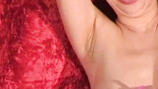 Bald babe restrained and tormented with hot wax in dungeon