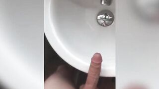 Sex crazed twink grabs his big dick and masturbates solo