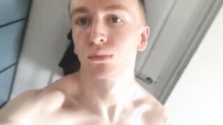 Sex crazed twink grabs his big dick and masturbates solo