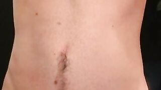 Inked and pierced mature masturbates and cums on his belly