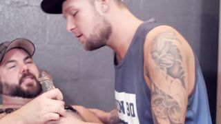 Sexy jock sucks on dildo while being hammered by hairy bear