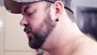 Sexy jock sucks on dildo while being hammered by hairy bear