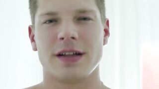 Athletic twink Sean White wanking whole large dick in room