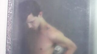He is crying out in the shower by tugging on his wet cock