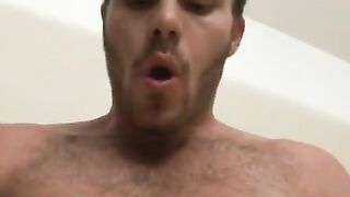 Shaggy chest Brazilian hunk jerks off his stone hard apparatus