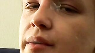 Tomy cant help rubbing his throbbing cock while smoking