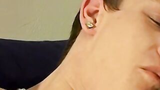 Tomy cant help rubbing his throbbing cock while smoking