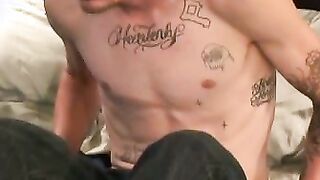 Tattooed dude enjoys smoking cigars and gently jerking off
