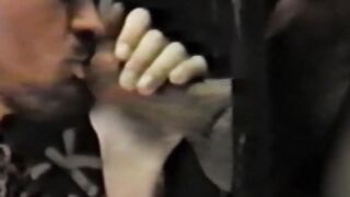 Traditional jock deepthroats strangers cock in a glory hole