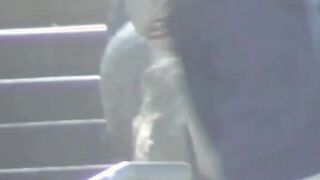 Flavorful Japanese angel is peeing outside during day time