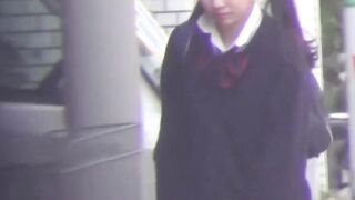 Flavorful Japanese angel is peeing outside during day time