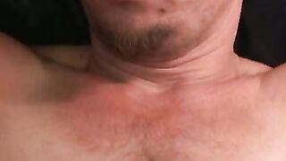 Mature stud pulls on his throbbing shaft while laying down