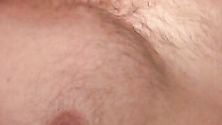 Mature stud pulls on his throbbing shaft while laying down