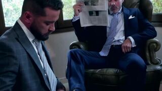 Hunky businessmen sucked and ridden by bearded colleague
