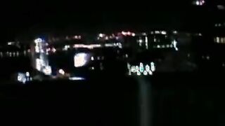 Good looking young man strokes his dick on the balcony solo