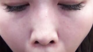 Handsome Oriental vixen stuffs mouth with plastic dick