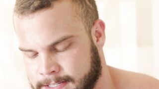 Muscular and bearded hunk barebacks his tattooed lover