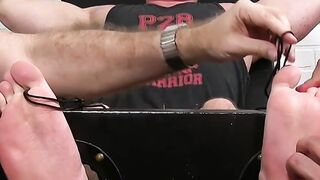 Bound stud tickled and teased by two homosexual freaks