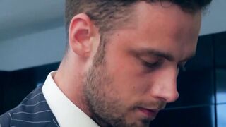 Elevator sex for a pair of businessmen in expensive suits