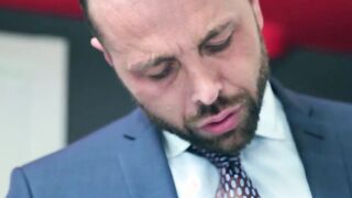 Desk sex for hunky gay men in expensive suits