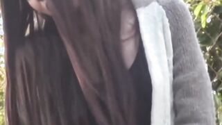 Japanese hottie filmed pleasuring herself on public bench