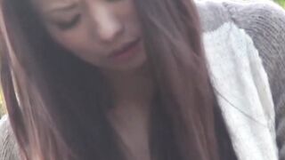 Japanese hottie filmed pleasuring herself on public bench