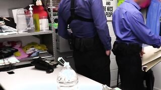 Big tit milf gags on two officers in the backroom
