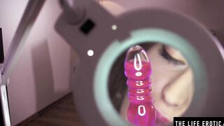 Huge-tits Beauty studies her bushy snatch with a magnifying glass