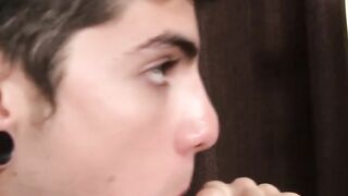 Cock blowing action ends with jock with tats getting facial