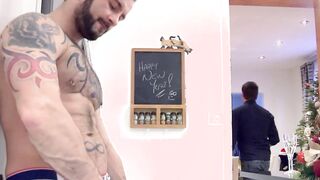Muscular tattooed gay hunk strokes his huge cock solo