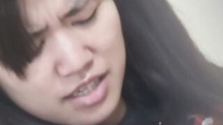 Nasty Japanese teenie shaves legs and fingers pussy