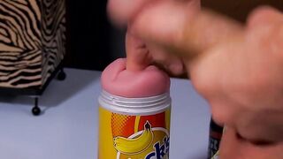 Young toy lover working on his big cock with a fleshlight