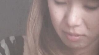 Unaware Japanese secretly filmed rubbing her hairy pussy