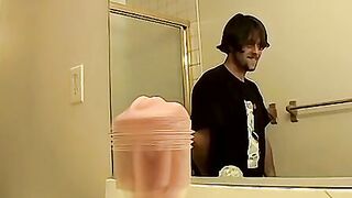 This straight dude is stroking his cock with fleshlight