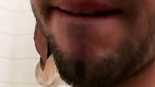 Gay hipster washes and jerks off his big uncut dick solo