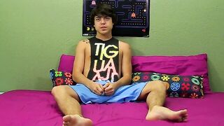 Youthful dollface Tristan Tyler plays with his butt and dick