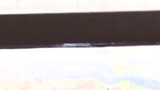 Asian dollface lifts her skirt up to show how she pees