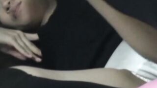 Japanese babe plays with her pussy while voyeur watches her