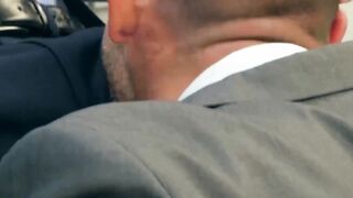 Hunk rimms in a suit and tie comfortingly pounding an irate boss