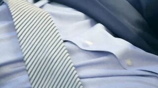 Hunk rimms in a suit and tie comfortingly pounding an irate boss