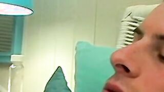 Mike Roberts blows a cloud of smoke while rubbing his cock