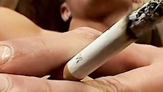 Smoking twink plays with his cock and enjoys it so much