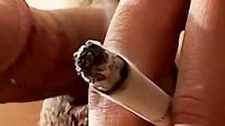 Smoking twink plays with his cock and enjoys it so much