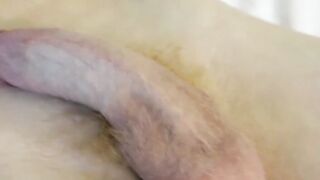 Blond twink pulls on his dick and drills his ass sensually