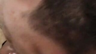 Black dude is waiting for his white friend to spray his face