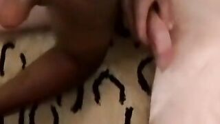 Black dude is waiting for his white friend to spray his face