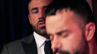 Executive in a suit dominates his pretty muscular employee