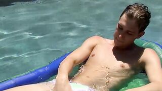 Skinny twink Patrick Kennedy jerks off in a pool outdoor