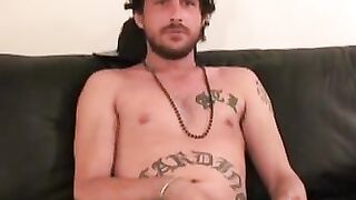 Inked thug rubbing hairy cock before solo cumshot