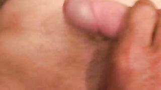 Amateur stud strokes his stiff dick and shoots a load of cum